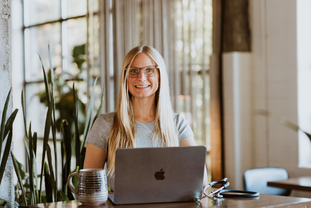 Nurse practitioner working on computer alison percowycz, NP